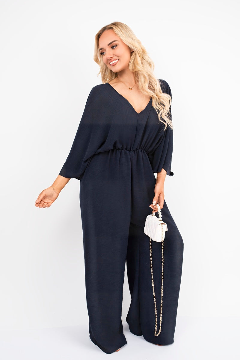 Wide Leg V Neck Jumpsuit with Back Tie Detail